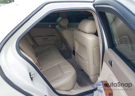 2010 Cadillac Sts Luxury Package from USA, damaged, VIN 1G6DU6EV6A0136702